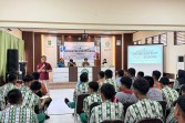 Kantor Imigrasi Pekanbaru Sosialisasikan Layanan dan Bahaya TPPO di SMK Negeri 5
